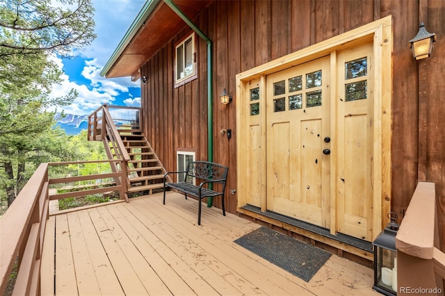 property entrance featuring a wooden deck