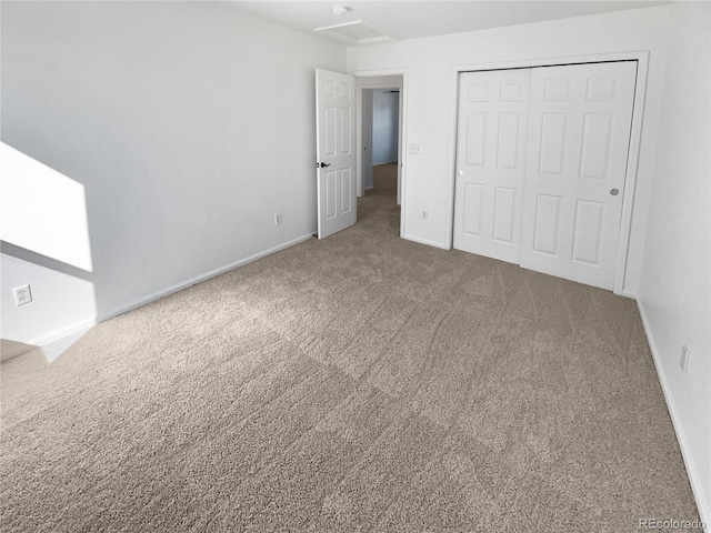 4735 S Cathay Ct, Aurora, CO 80015 - unfurnished bedroom with carpet floors, a closet, and attic access