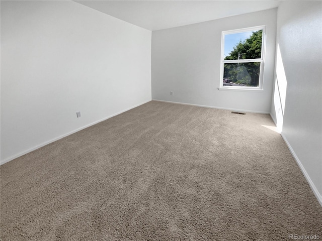 4735 S Cathay Ct, Aurora, CO 80015 - carpeted spare room with baseboards