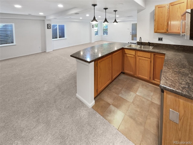 4735 S Cathay Ct, Aurora, CO 80015 - kitchen with light colored carpet, open floor plan, a peninsula, recessed lighting, and decorative light fixtures