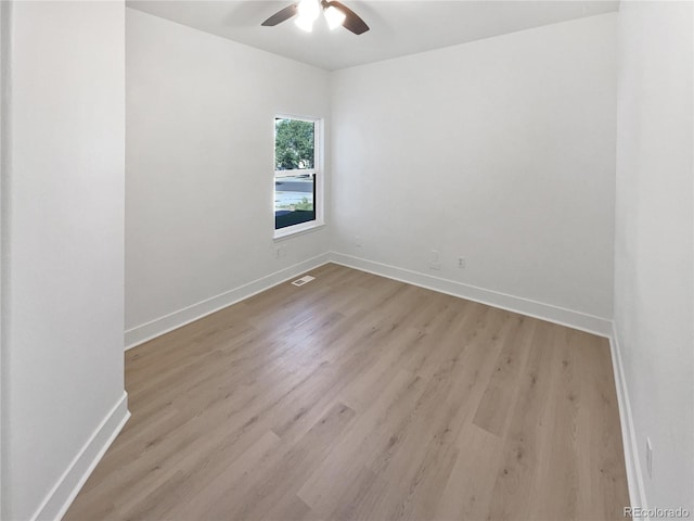 4735 S Cathay Ct, Aurora, CO 80015 - spare room with a ceiling fan and wood finished floors