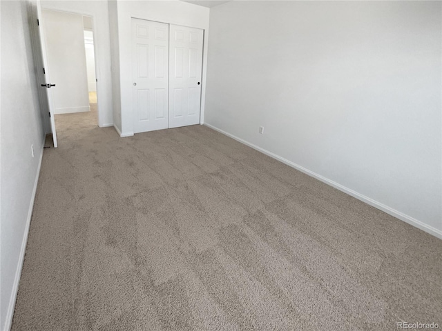 4735 S Cathay Ct, Aurora, CO 80015 - unfurnished bedroom featuring carpet and a closet