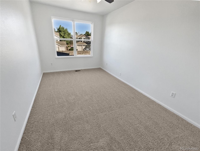 4735 S Cathay Ct, Aurora, CO 80015 - carpeted empty room featuring baseboards and ceiling fan
