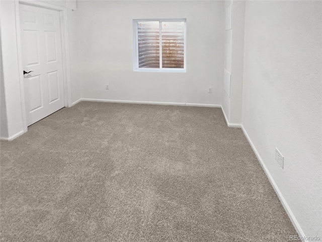 4735 S Cathay Ct, Aurora, CO 80015 - unfurnished bedroom with carpet and baseboards