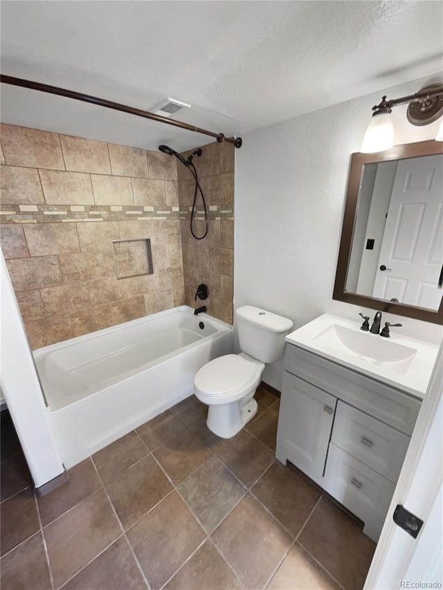 4735 S Cathay Ct, Aurora, CO 80015 - full bath featuring shower / bath combination, a textured ceiling, vanity, and a textured wall