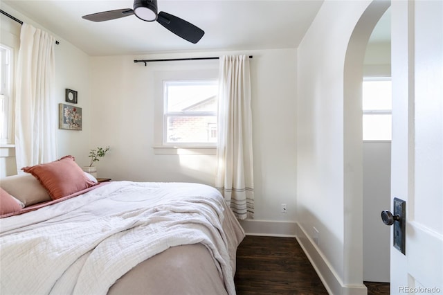 bedroom featuring dark wood-type flooring and ceiling fan