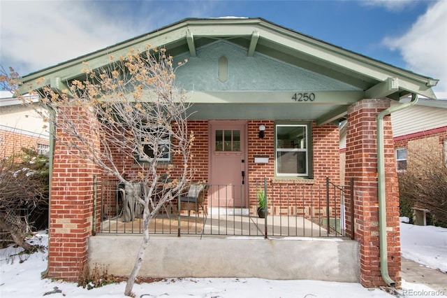 view of front of home featuring covered porch