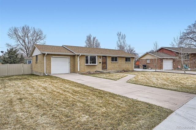 single story home featuring brick siding, a front yard, fence, a garage, and driveway