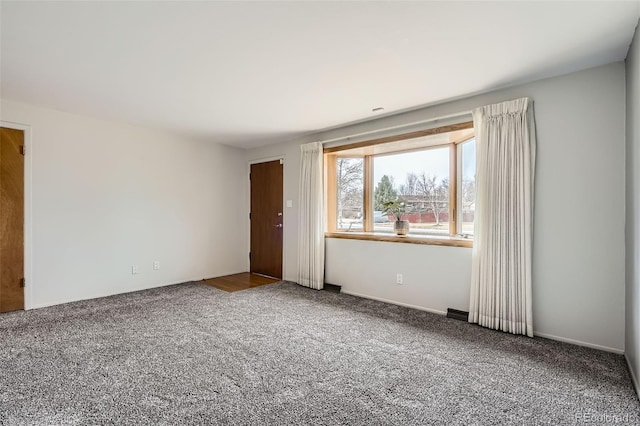 empty room with carpet floors