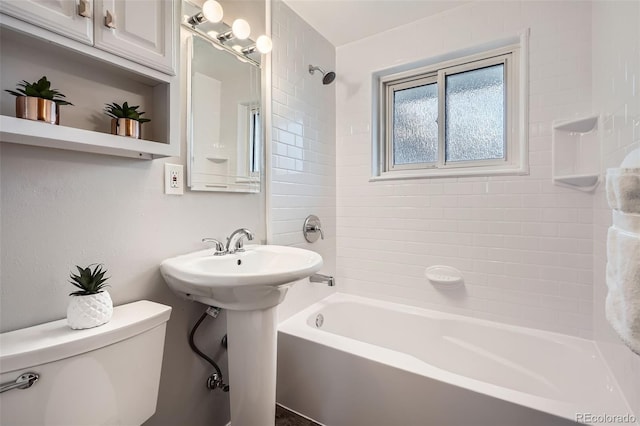 full bath featuring bathtub / shower combination and toilet