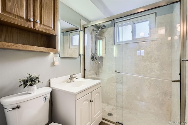 bathroom featuring plenty of natural light and a shower stall