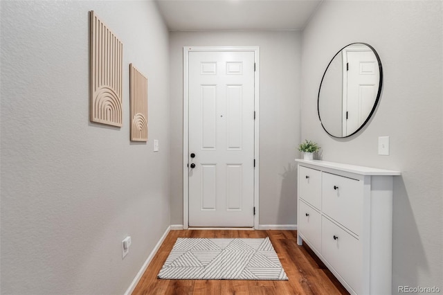 doorway to outside featuring hardwood / wood-style floors