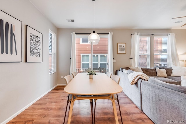 dining room featuring light hardwood / wood-style flooring