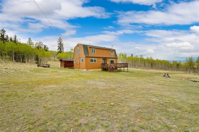 584 Old Squaw Rd, Como, CO 80432 - view of green lawn featuring a wooden deck and stairway
