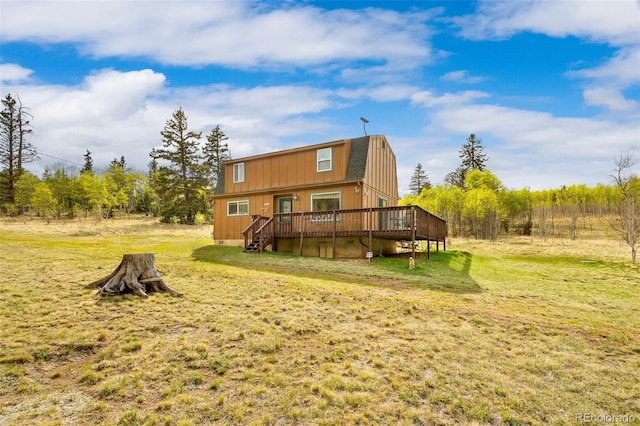584 Old Squaw Rd, Como, CO 80432 - back of property with a deck and a lawn