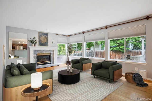 5721 S Jellison St, Littleton, CO 80123 - living room with wood finished floors and a fireplace
