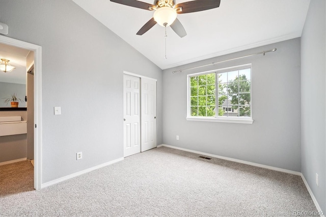 5721 S Jellison St, Littleton, CO 80123 - unfurnished bedroom featuring carpet floors, lofted ceiling, a closet, and ceiling fan