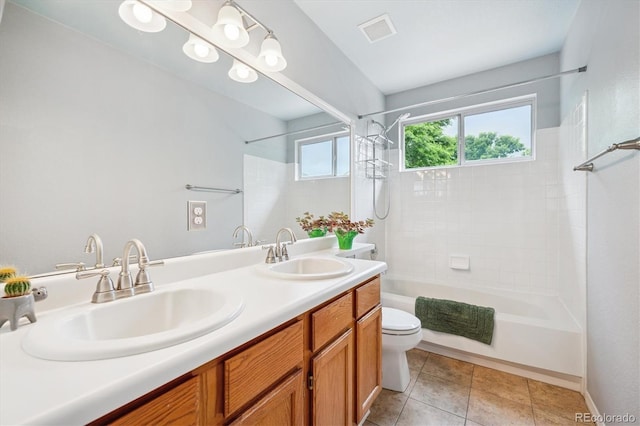 5721 S Jellison St, Littleton, CO 80123 - bathroom featuring shower / washtub combination, double vanity, and tile patterned floors