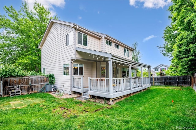 5721 S Jellison St, Littleton, CO 80123 - back of house featuring a fenced backyard and a wooden deck