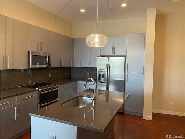 336 E 1st Ave Unit 310, Denver, CO 80203 - kitchen with a sink, stainless steel appliances, dark countertops, backsplash, and recessed lighting