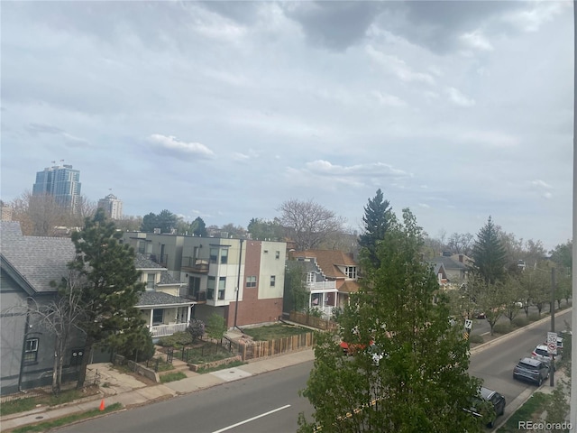 336 E 1st Ave Unit 310, Denver, CO 80203 - view of asphalt road with sidewalks, curbs, and a residential view