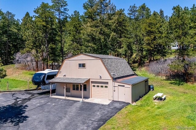 8045 S Wagon Wheel Rd, Morrison, CO 80465 - garage with driveway
