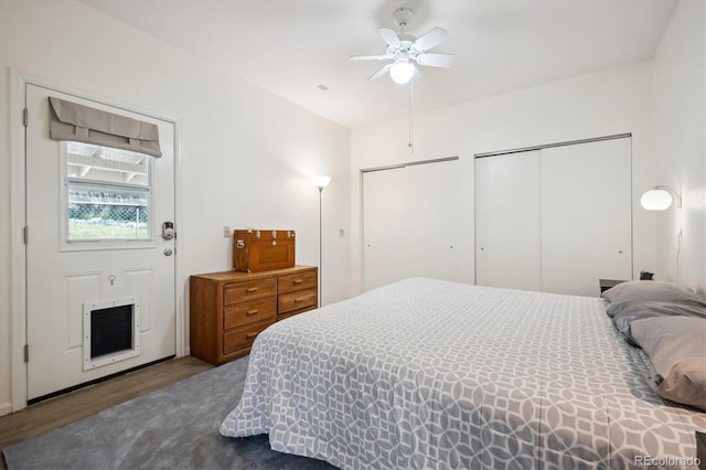 8045 S Wagon Wheel Rd, Morrison, CO 80465 - bedroom featuring wood finished floors, multiple closets, and ceiling fan