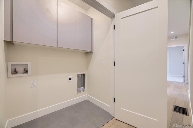 2466 S Cherokee St, Denver, CO 80223 - washroom with cabinet space, washer hookup, and hookup for an electric dryer