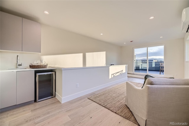 2466 S Cherokee St, Denver, CO 80223 - indoor wet bar featuring beverage cooler, light wood-type flooring, recessed lighting, and an AC wall unit