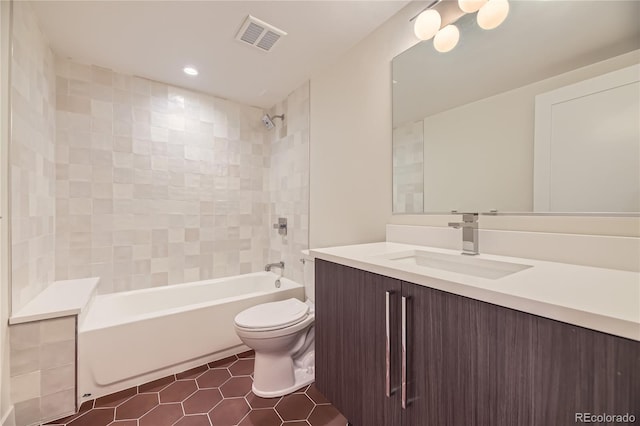 2466 S Cherokee St, Denver, CO 80223 - full bathroom with vanity, tile patterned flooring, shower / bathtub combination, and recessed lighting