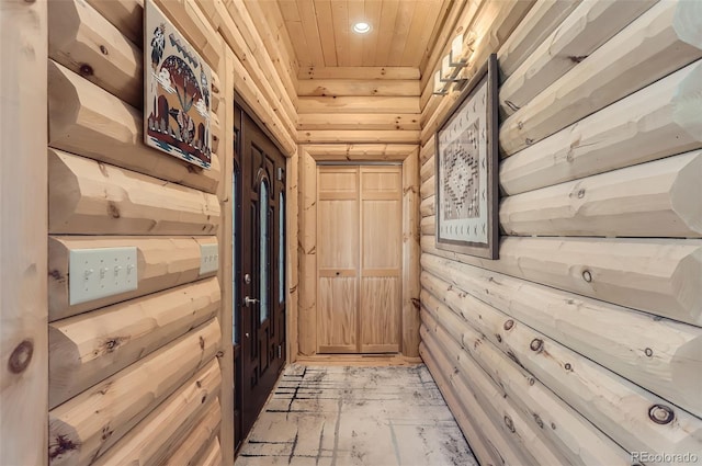 doorway to outside with wooden ceiling and recessed lighting