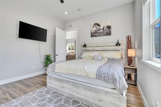 499 Silver Creek Rd, Idaho Springs, CO 80452 - bedroom with baseboards, wood finished floors, and recessed lighting