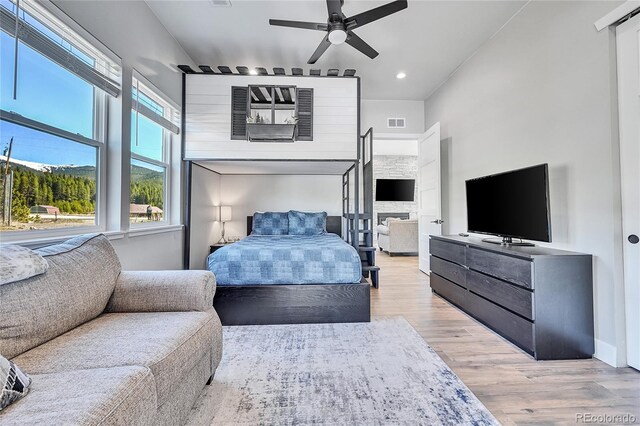 499 Silver Creek Rd, Idaho Springs, CO 80452 - bedroom with wood finished floors, recessed lighting, and a ceiling fan