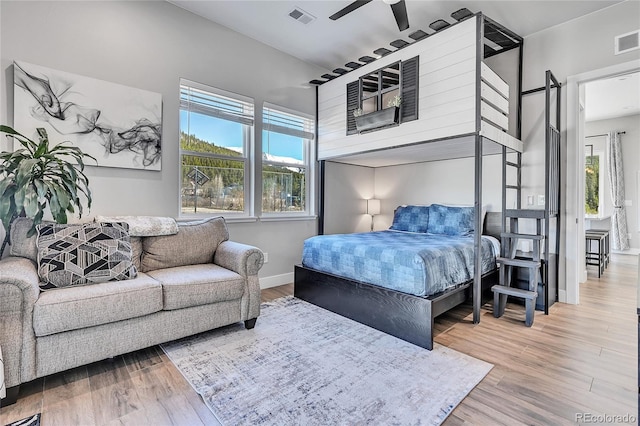 499 Silver Creek Rd, Idaho Springs, CO 80452 - bedroom with wood finished floors, baseboards, and a ceiling fan