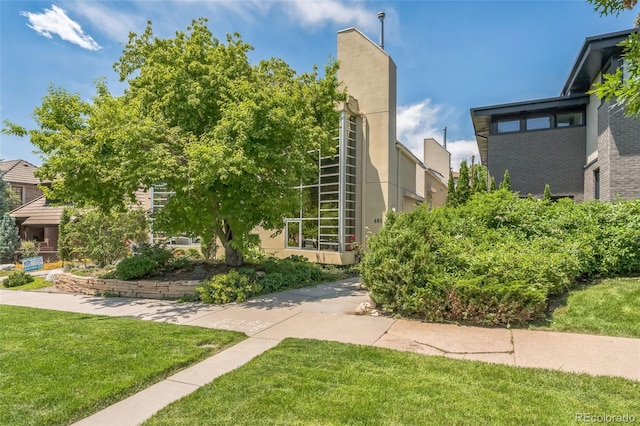 461 Fillmore St, Denver, CO 80206 - view of home's community with a lawn