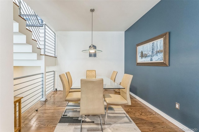 461 Fillmore St, Denver, CO 80206 - dining room featuring wood finished floors and stairway