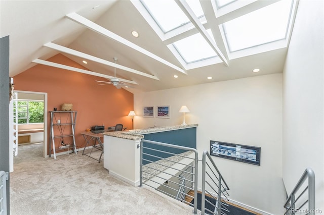 461 Fillmore St, Denver, CO 80206 - stairs featuring a skylight, vaulted ceiling, recessed lighting, and carpet