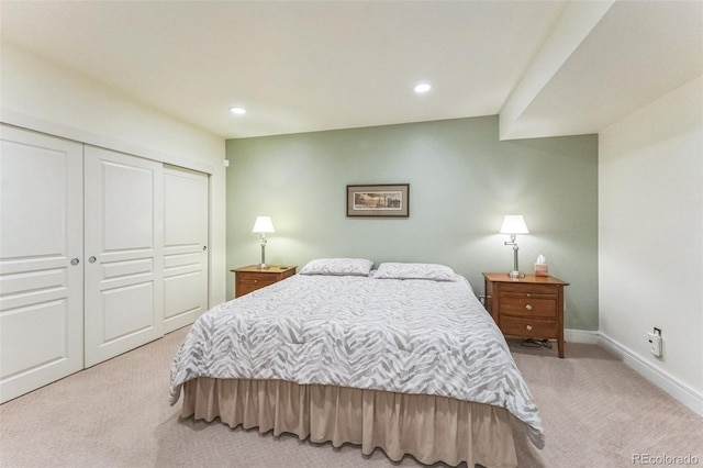 461 Fillmore St, Denver, CO 80206 - bedroom with light colored carpet, a closet, and recessed lighting