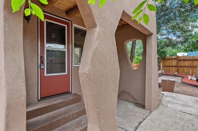 13 Crystal Park Rd, Manitou Springs, CO 80829 - doorway to property with stucco siding