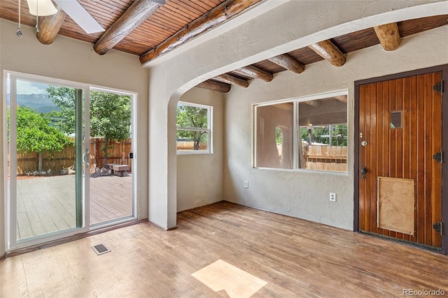 13 Crystal Park Rd, Manitou Springs, CO 80829 - unfurnished sunroom with arched walkways and beam ceiling