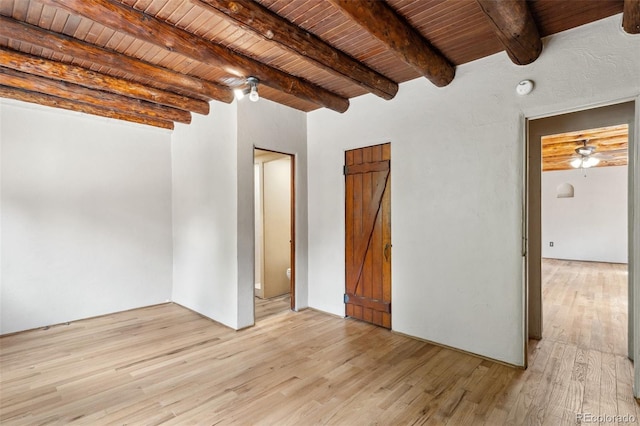 13 Crystal Park Rd, Manitou Springs, CO 80829 - unfurnished bedroom featuring light wood-style floors and a wooden ceiling with exposed beams