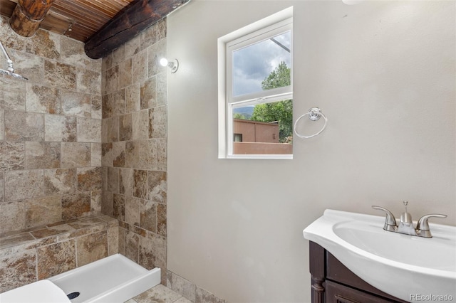 13 Crystal Park Rd, Manitou Springs, CO 80829 - bathroom with tiled shower, vanity, and wooden ceiling