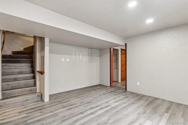 13 Crystal Park Rd, Manitou Springs, CO 80829 - finished basement with light wood finished floors, stairway, and recessed lighting