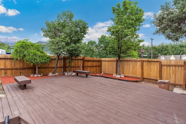 13 Crystal Park Rd, Manitou Springs, CO 80829 - wooden terrace with a fenced backyard and a mountain view