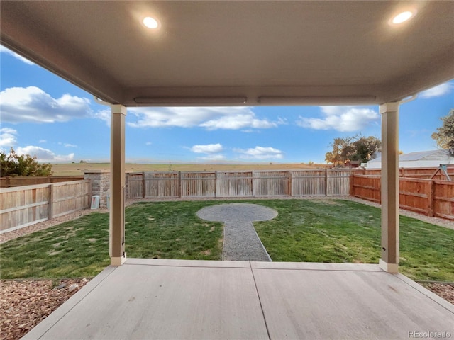 view of yard with a patio area