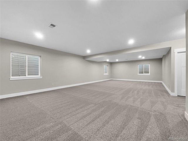 basement with carpet flooring