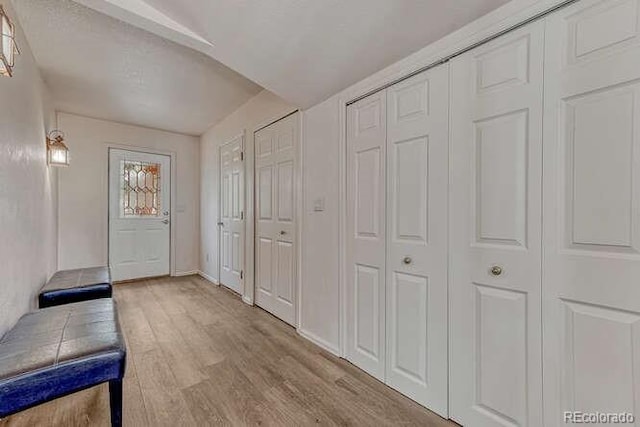 14694 Crooked Trail Rd, Woodland Park, CO 80863 - entrance foyer with wood finished floors and baseboards