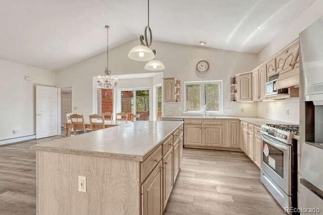 14694 Crooked Trail Rd, Woodland Park, CO 80863 - kitchen with stainless steel range with gas cooktop, light wood finished floors, light brown cabinetry, light countertops, and open shelves