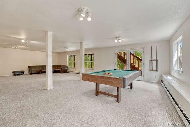 14694 Crooked Trail Rd, Woodland Park, CO 80863 - playroom featuring baseboard heating, billiards, healthy amount of natural light, and carpet flooring