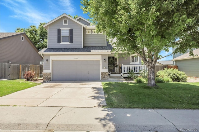 12585 S Beaver Creek Way, Parker, CO 80134 - view of front facade with driveway, an attached garage, stone siding, and a shingled roof